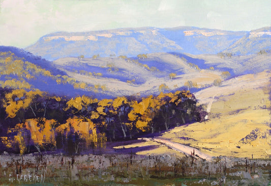 Rolling countryside with gum trees and dramatic sky, painted in oils