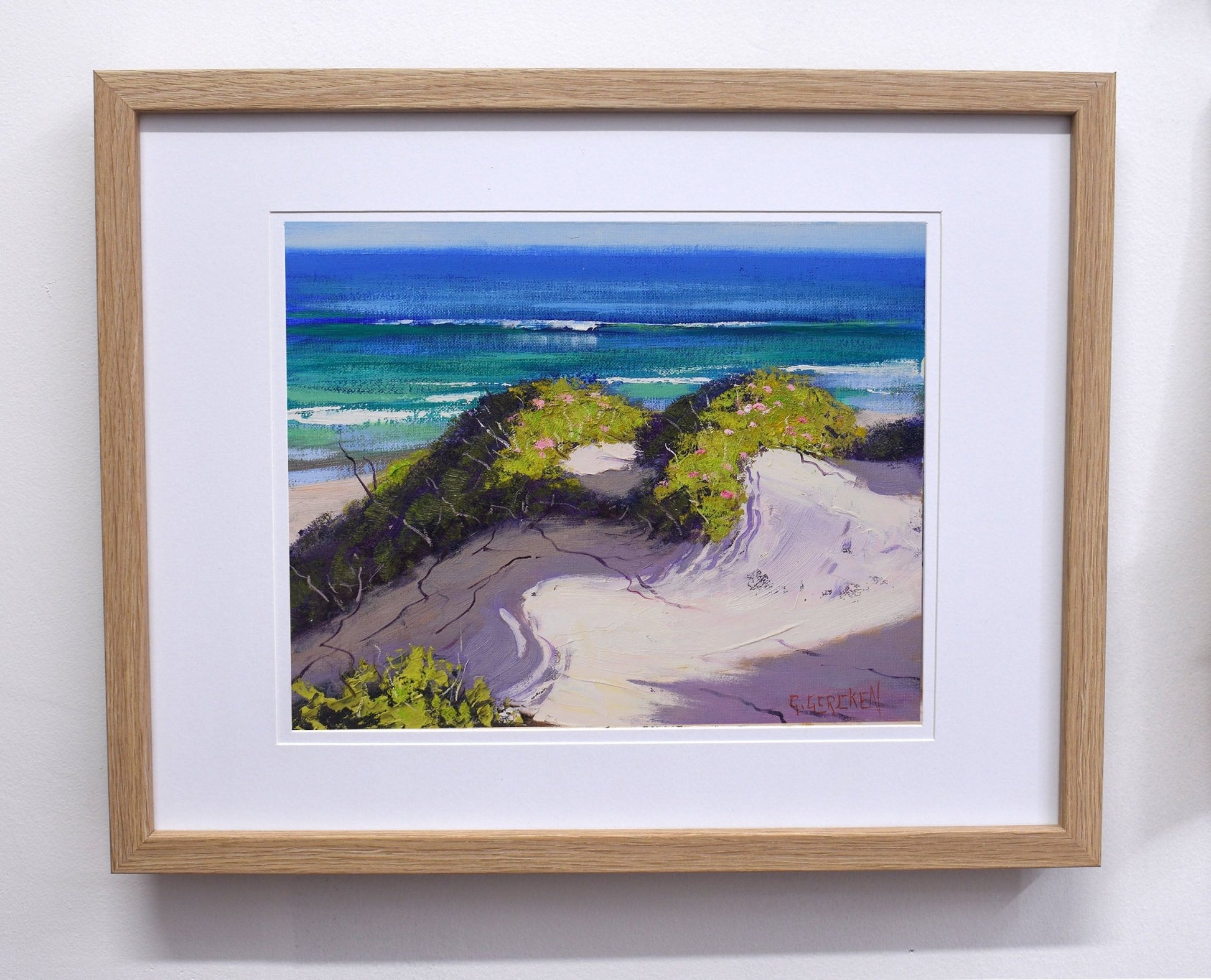 Sunlit coastal sand dunes with blue ocean view, painted in oils