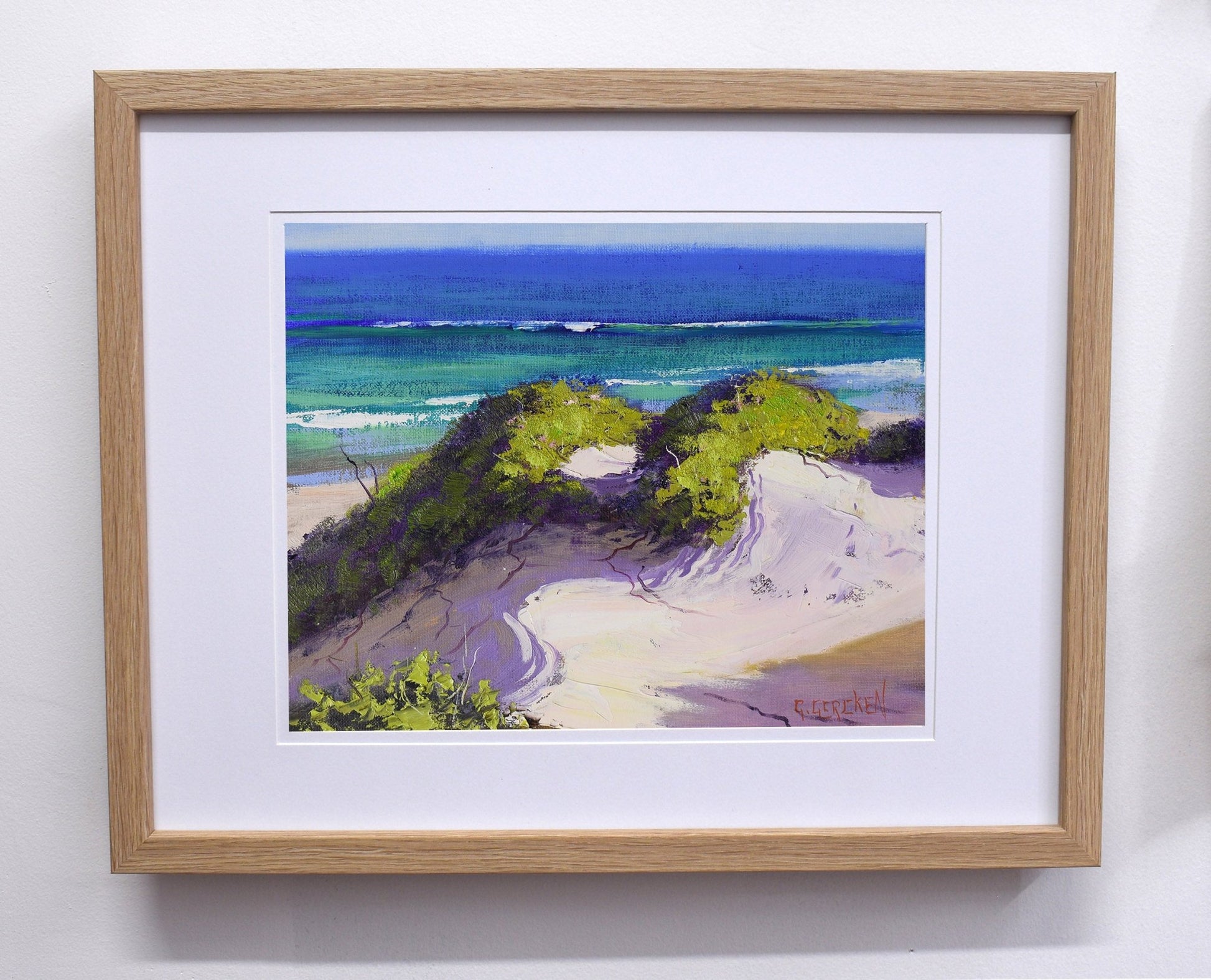 Sunlit coastal sand dunes with blue ocean view, painted in oils