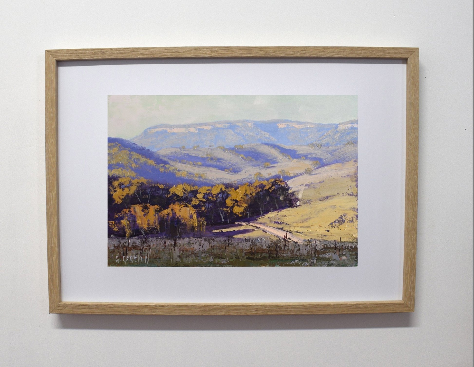 Rolling countryside with gum trees and dramatic sky, painted in oils