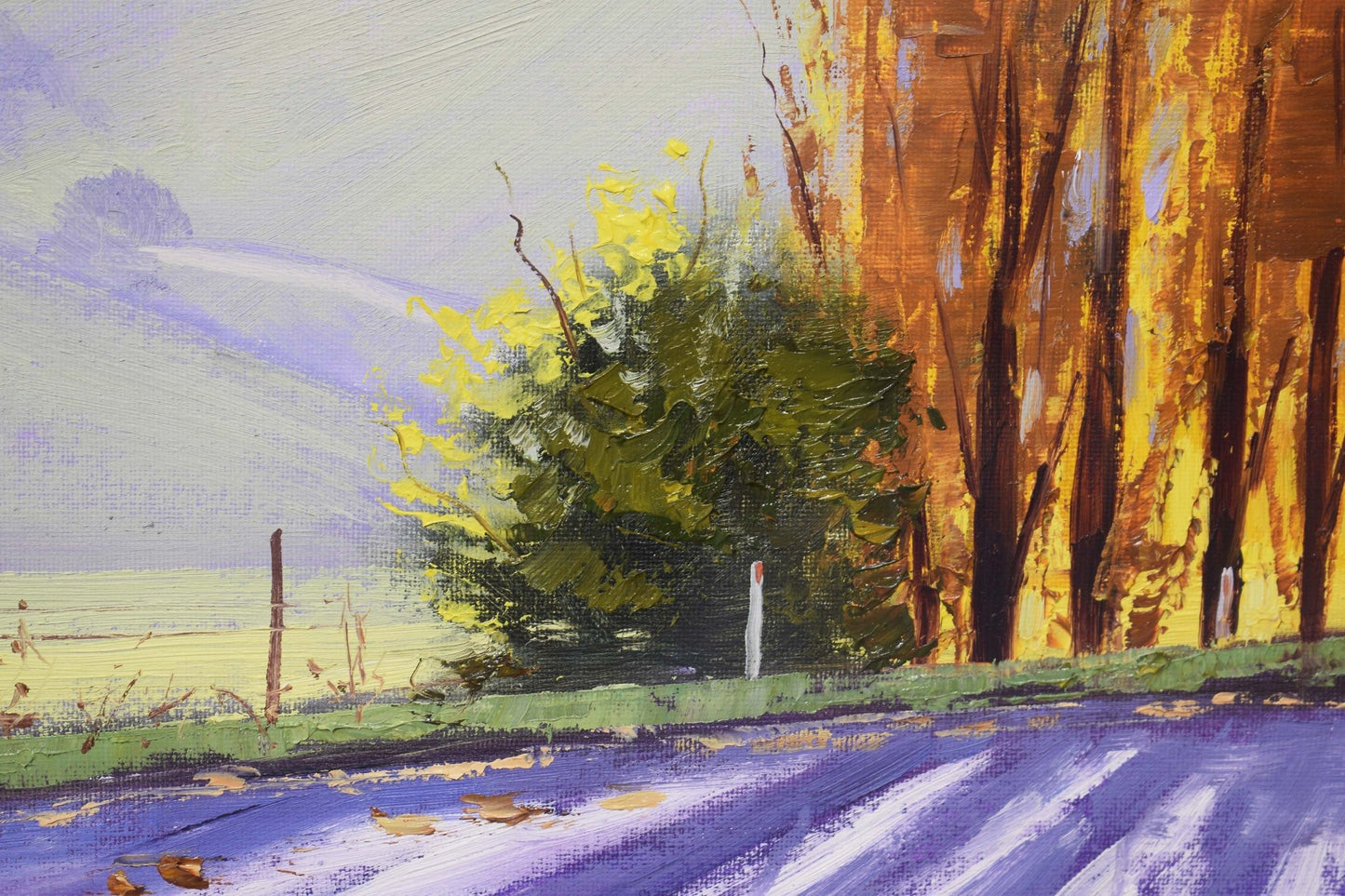 Painting of a landscape with trees, grass, and a road.