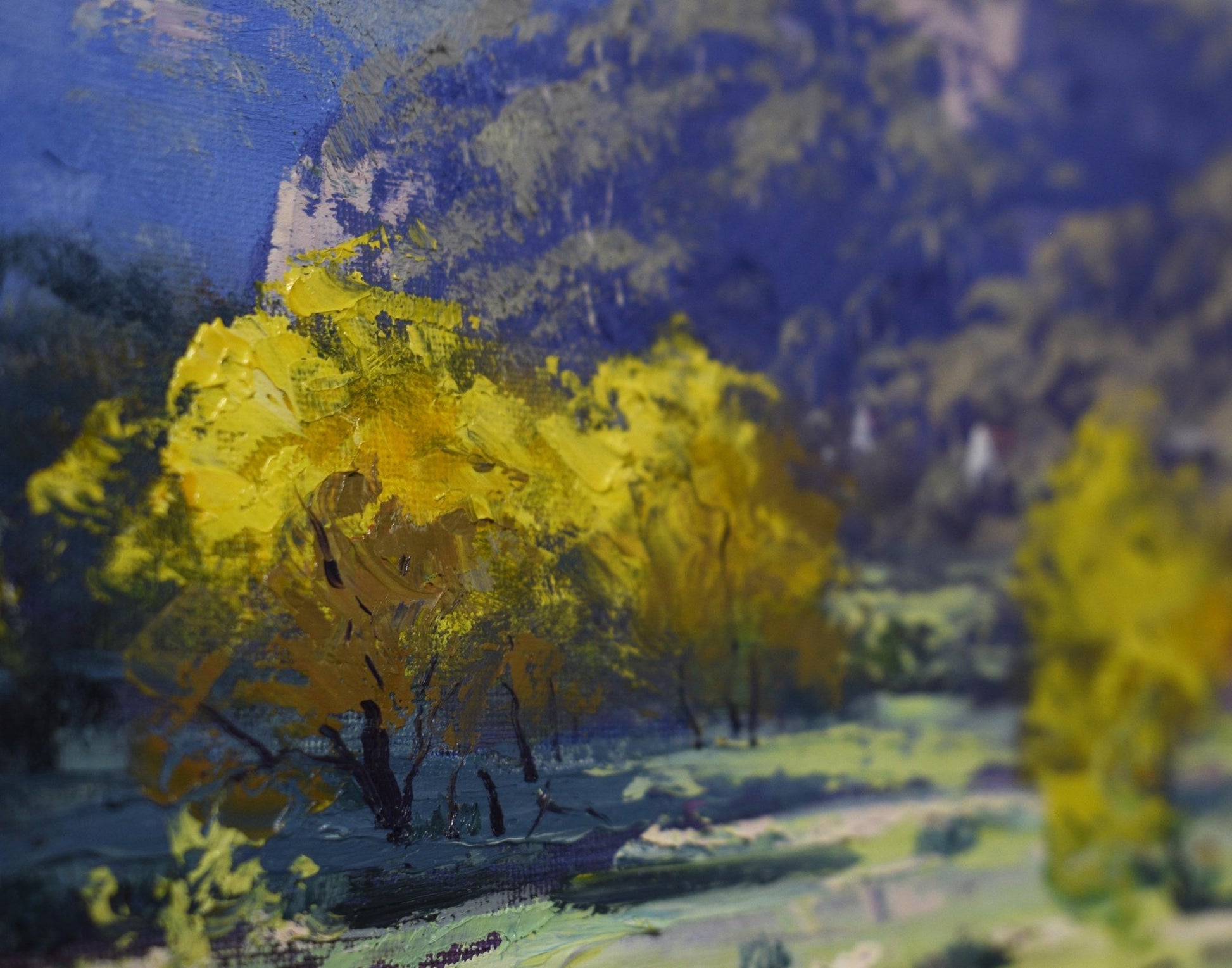 Painting of trees with yellow foliage in a mountainous landscape