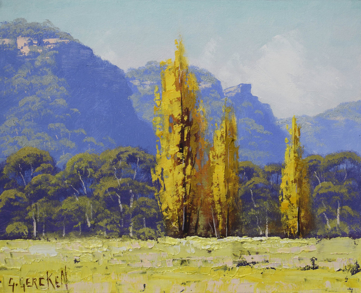 Painting of a landscape with yellow trees and mountains in the background